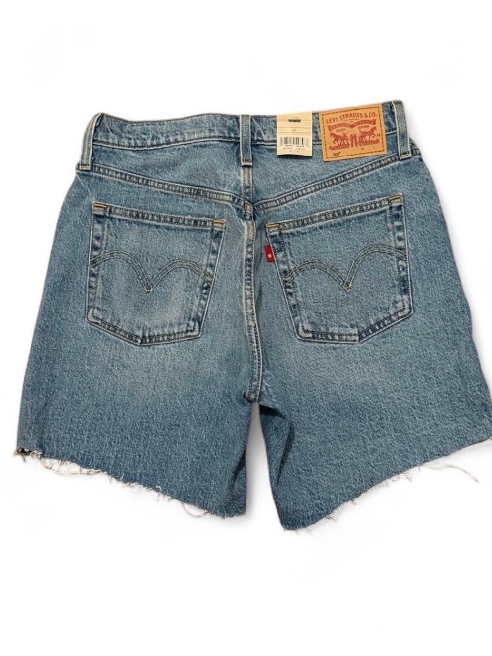 Levi’s 501 women’s mid thigh blue raw hem jean shorts